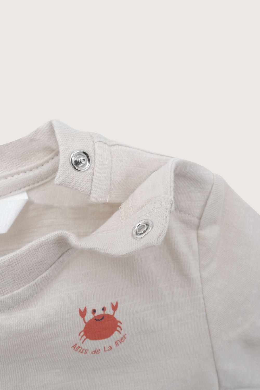 Conjunto polera y short beige de niño-4