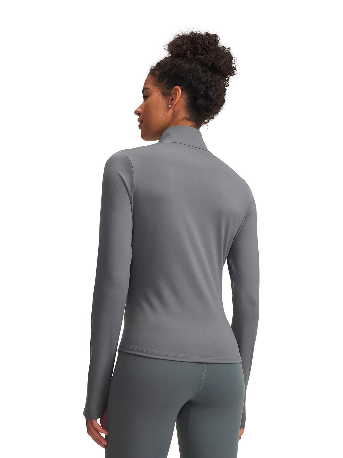 Poleron UA Motion Verde Mujer-1