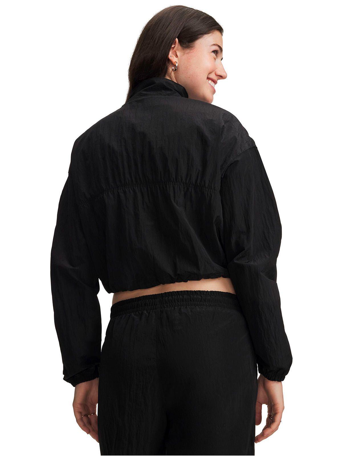 Poleron Rival Woven negra Mujer-1