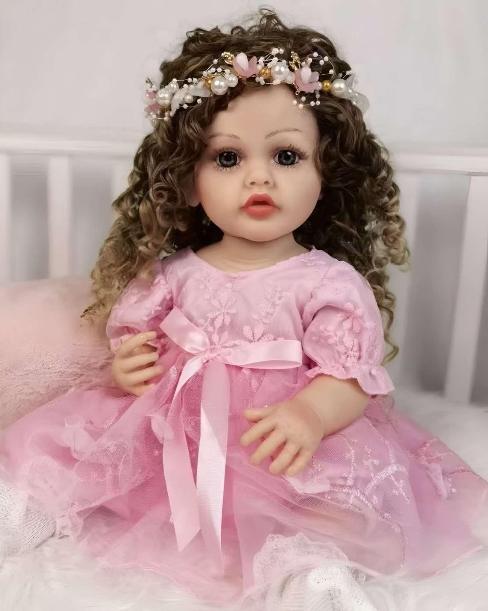 MUÑECA BEBÉ REALISTA DE 55 CM 100% SILICON CON VESTIDO W5-2