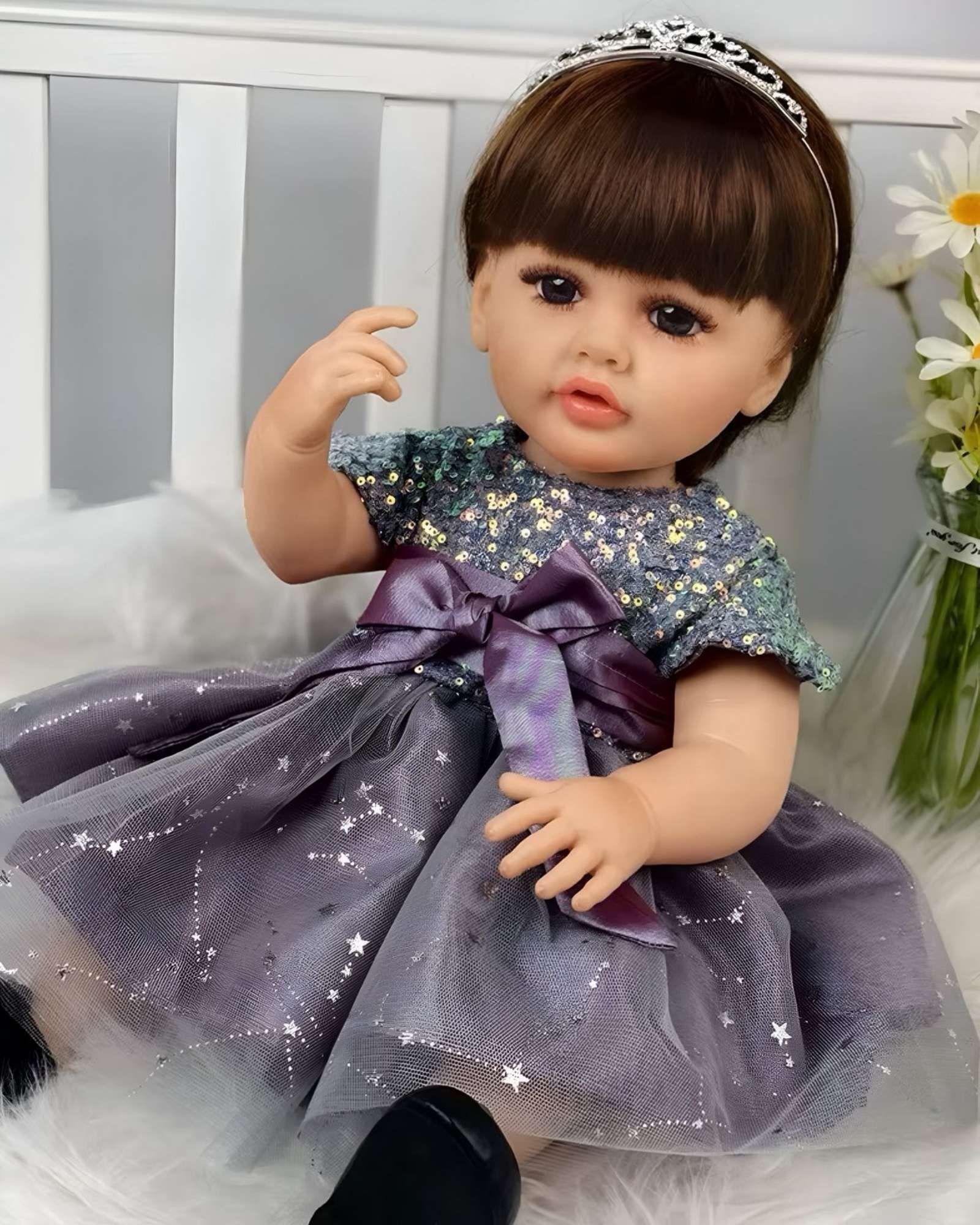 MUÑECA BEBÉ REALISTA DE 55 CM 100% SILICON CON VESTIDO W7-3