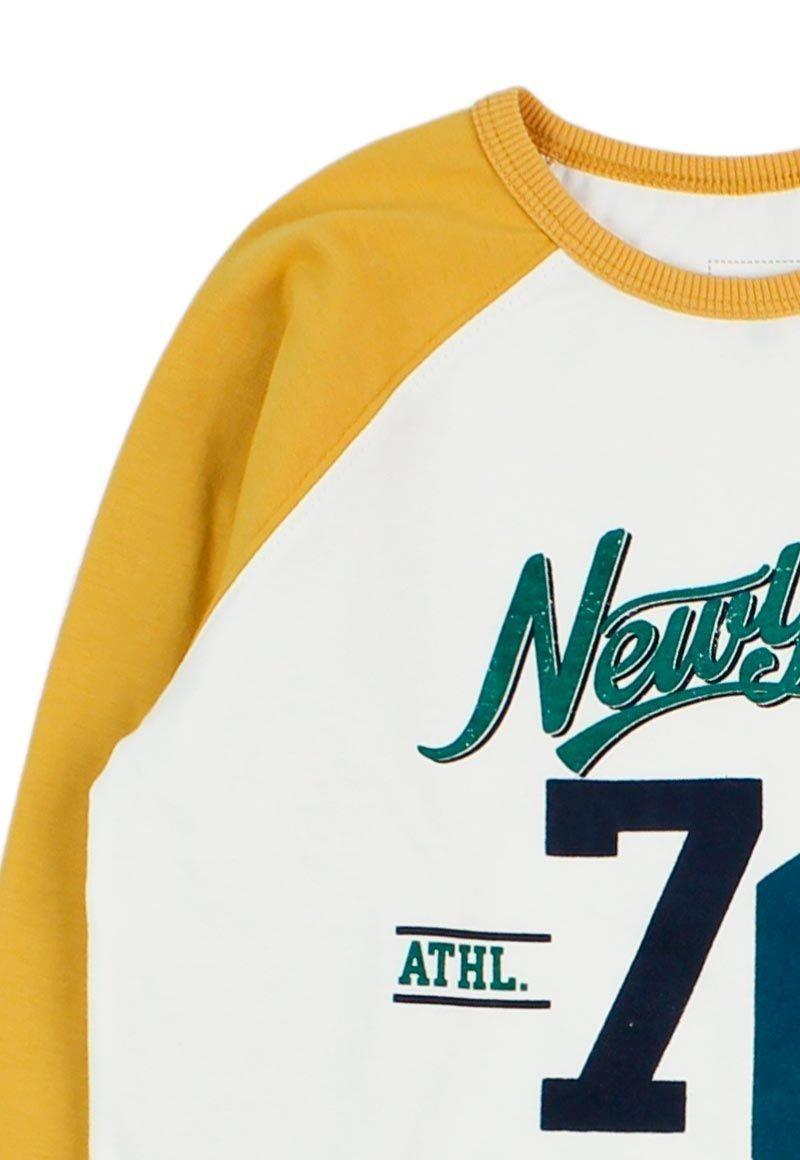 Polera jr niño m/ raglan stronger 325-2