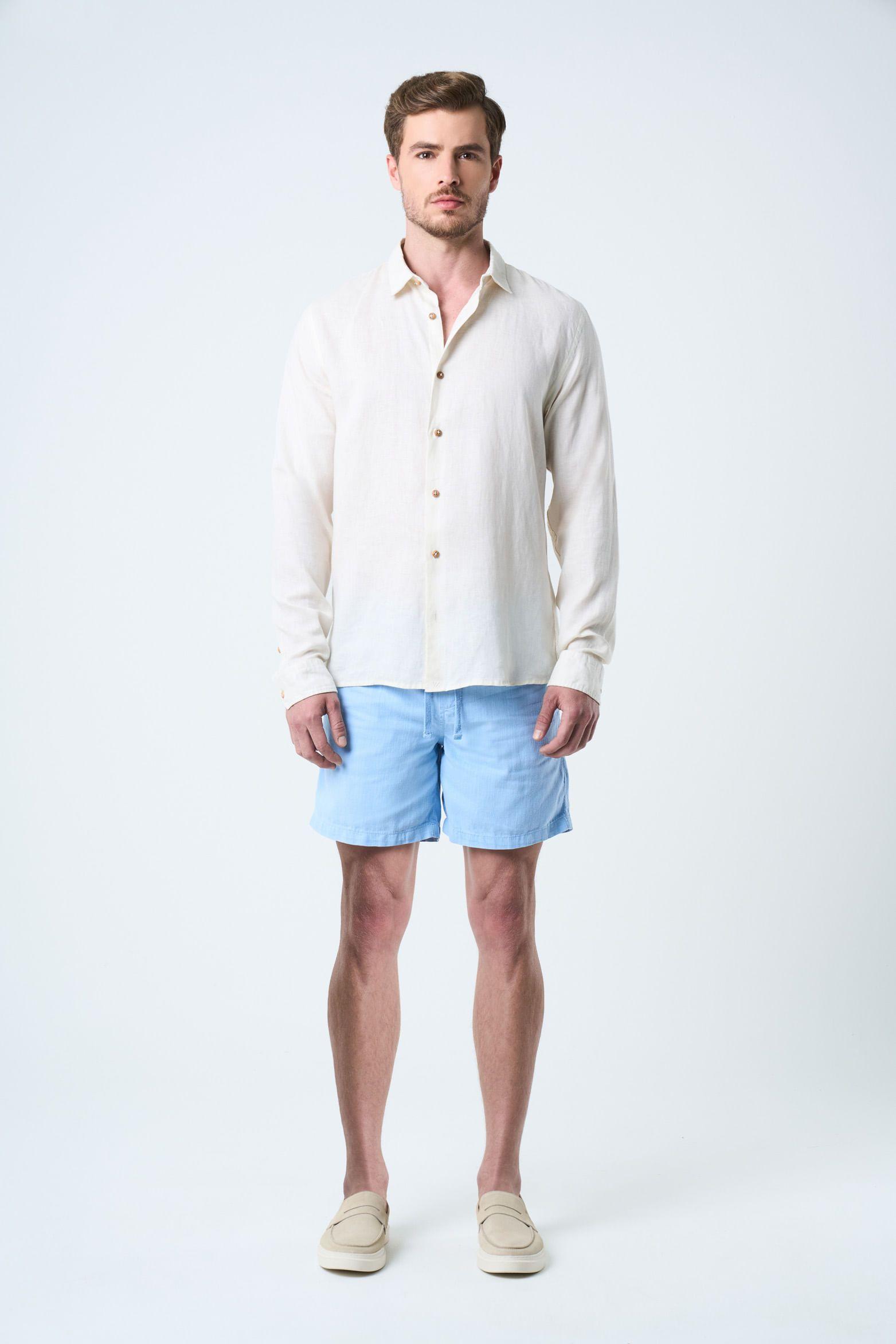 Bermuda Marfil en lino para hombre silueta amplia azul claro-0