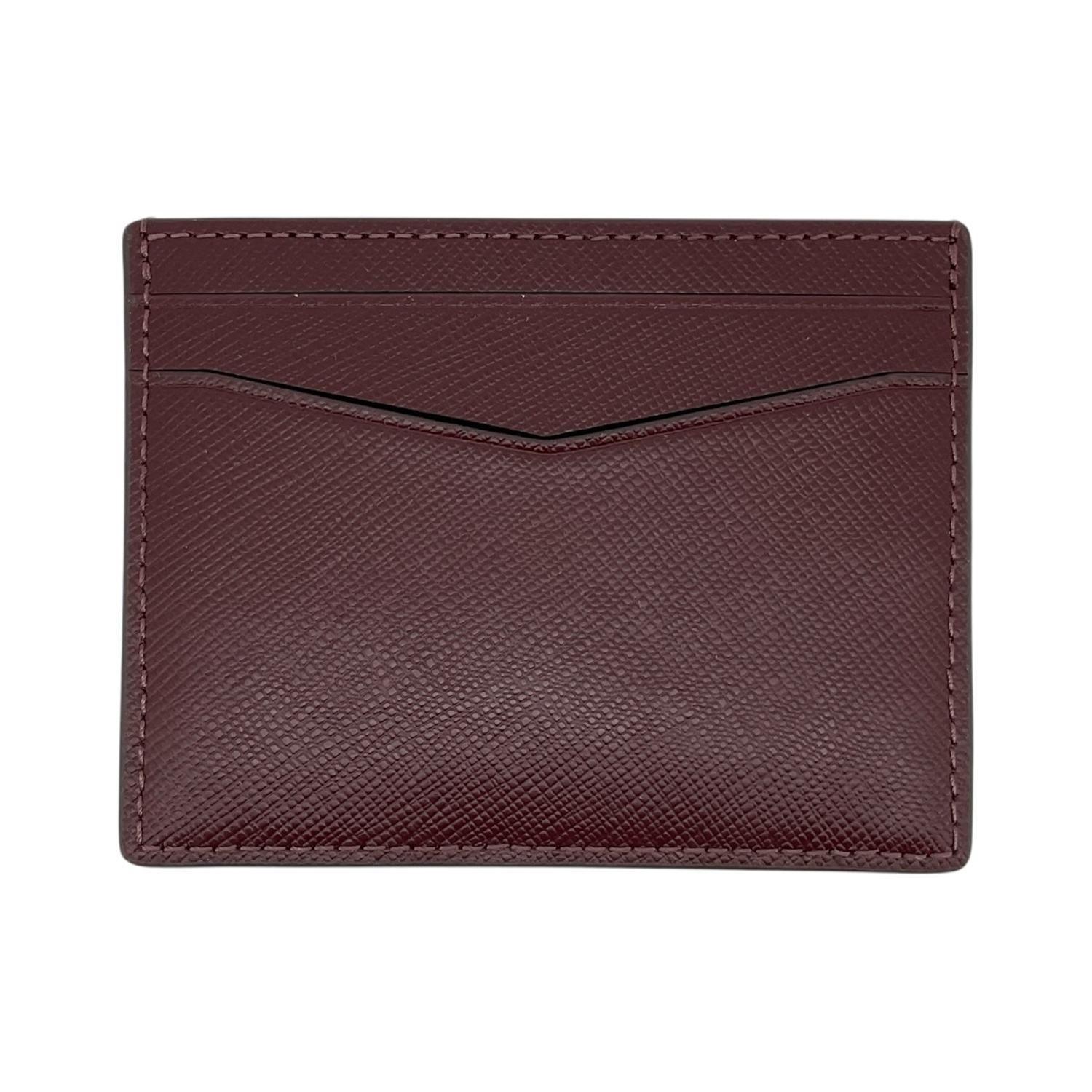 Tarjetero Kate Spade Staci Slim Saffiano WLR00129-V-1