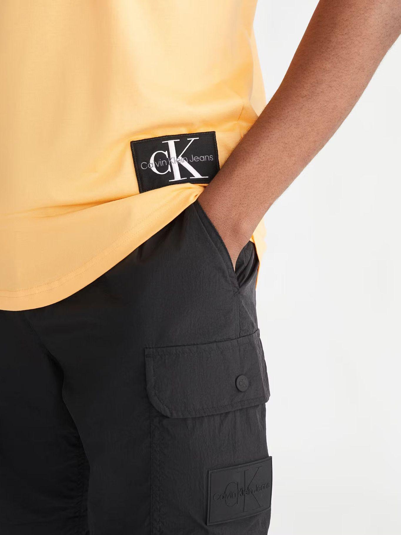 Polera Badge Round Naranja Calvin Klein-3