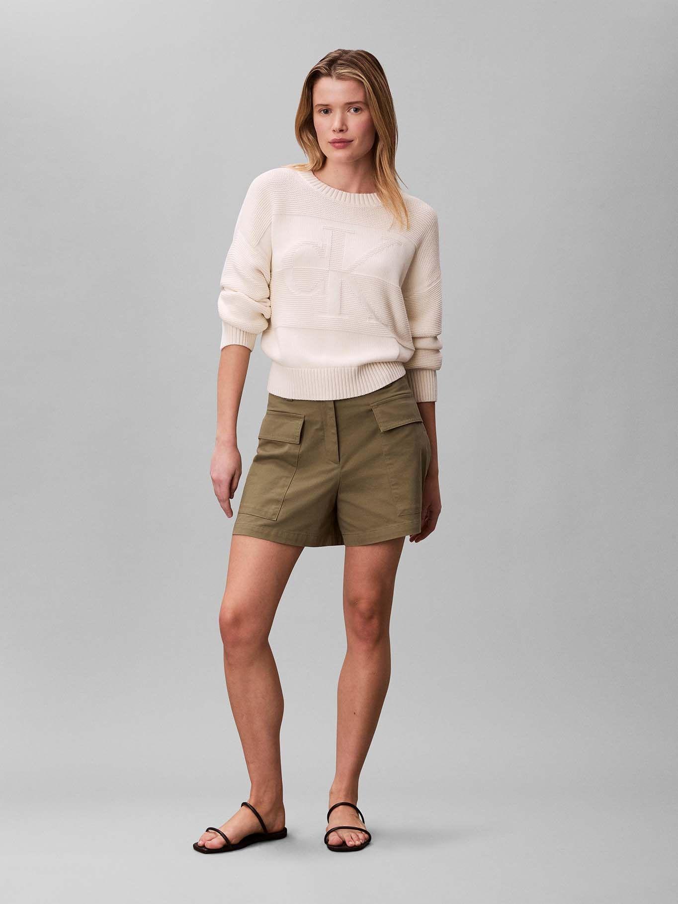 Sweater con Logo Tejido Tonal Crema Calvin Klein-1