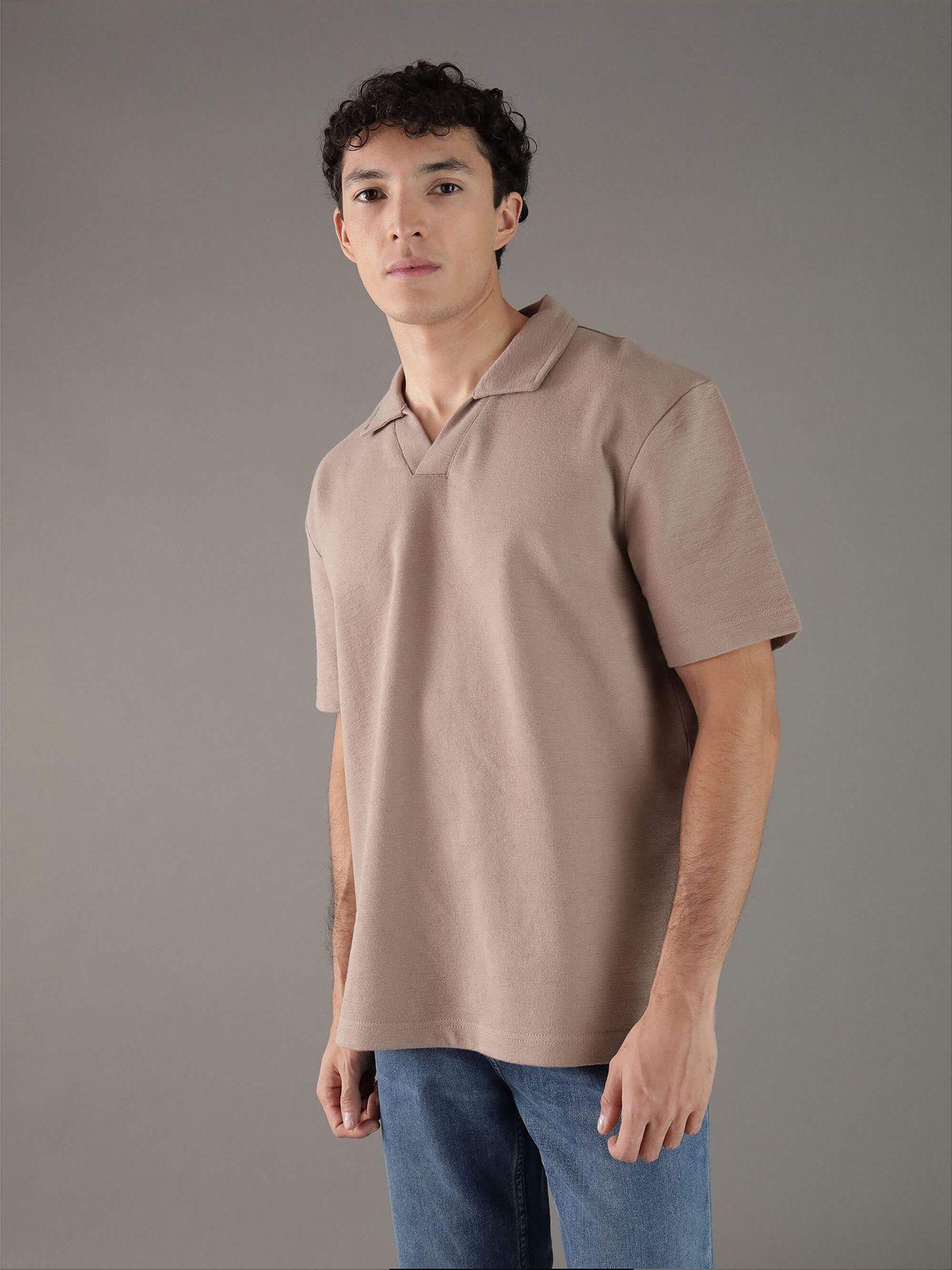 Polo texturizado con tejido crepé Beige Calvin Klein-0