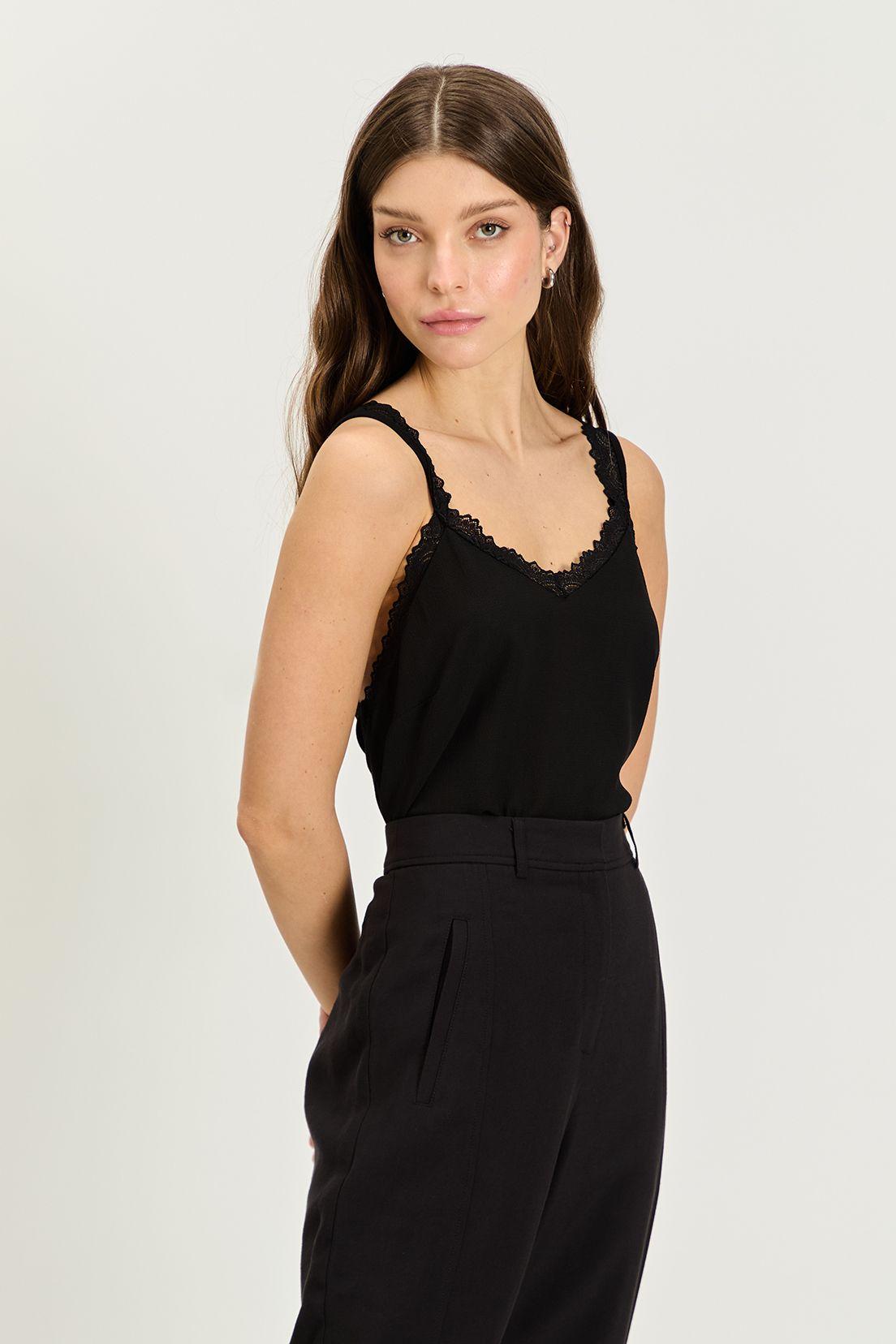 Polera Lisa Negro iO 14220224008102-2