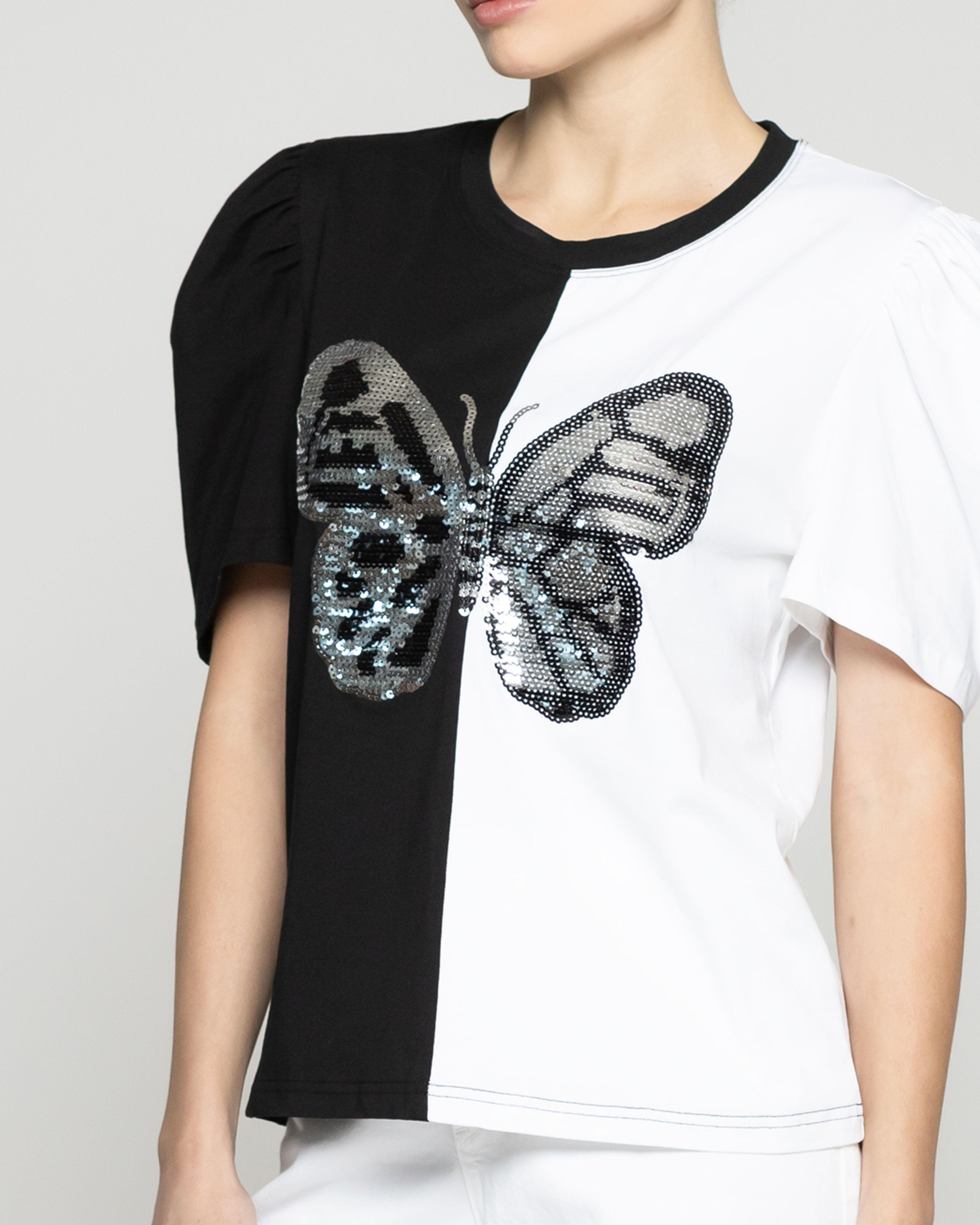 Polera Mujer Ofelia Manga Corta Con Estampado Mariposa Brillante Blanca Y Negra Lineatre-2