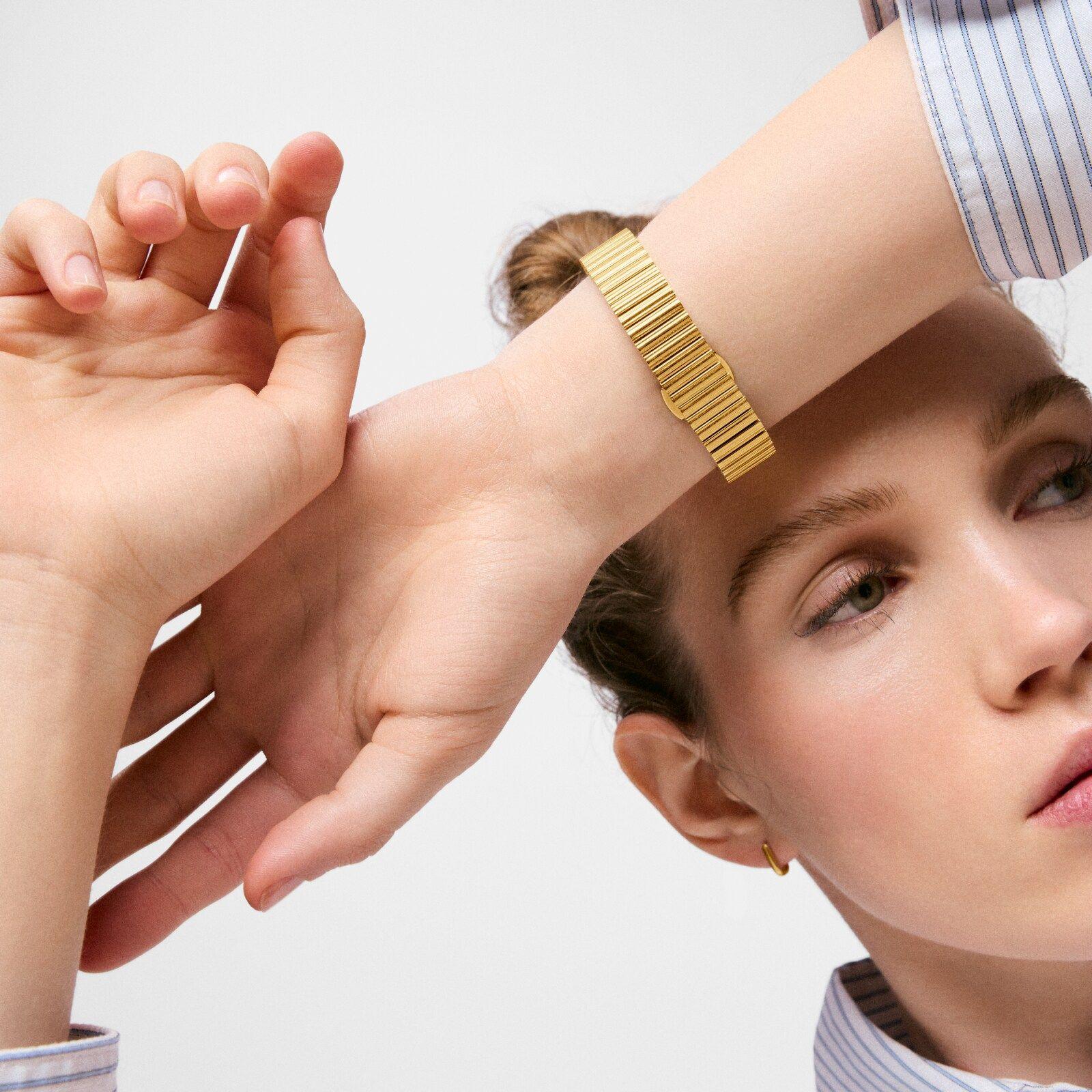 Reloj analógico con brazalete de acero dorado TOUS 1950-5