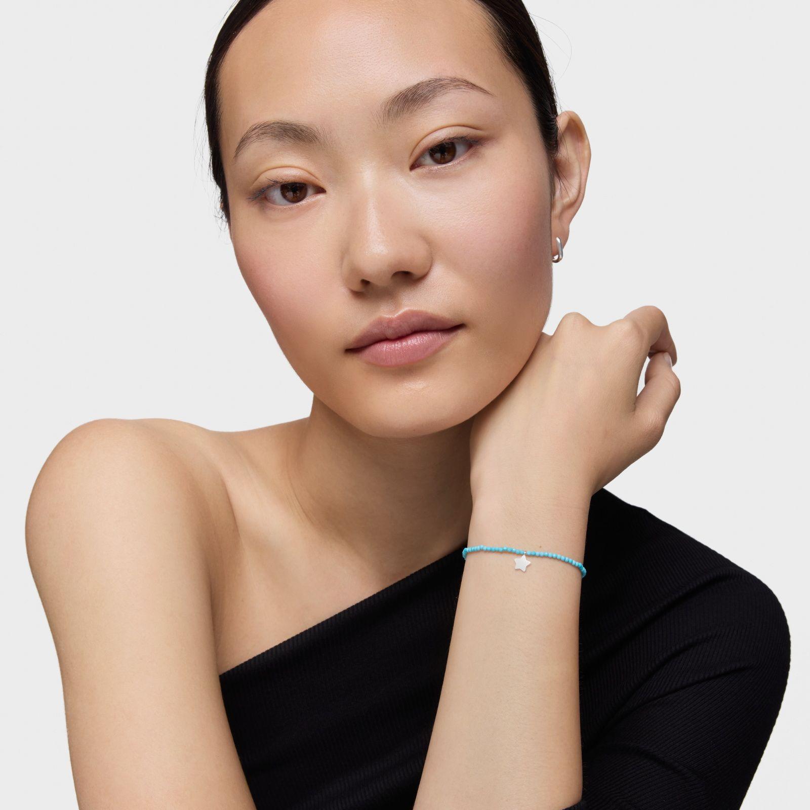Pulsera elástica con magnesia azul y estrella de plata TOUS Motivos-3
