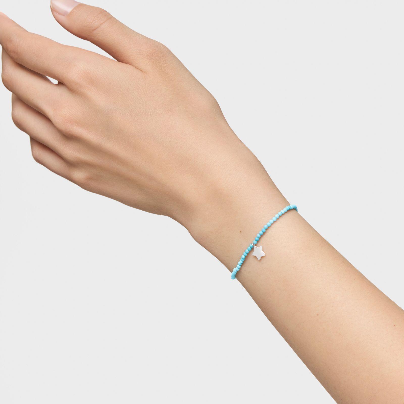 Pulsera elástica con magnesia azul y estrella de plata TOUS Motivos-5