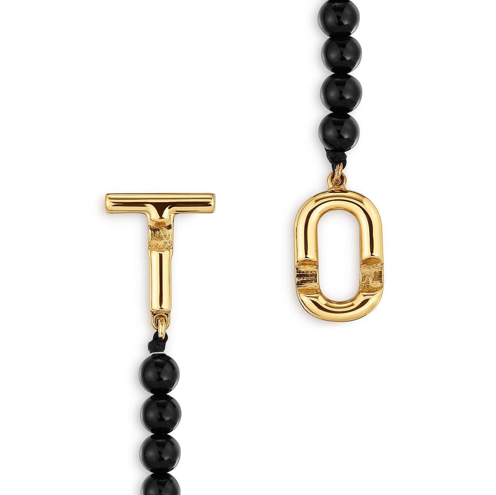 Pulsera con baño de oro 18 kt sobre plata y ónix Manifesto-2