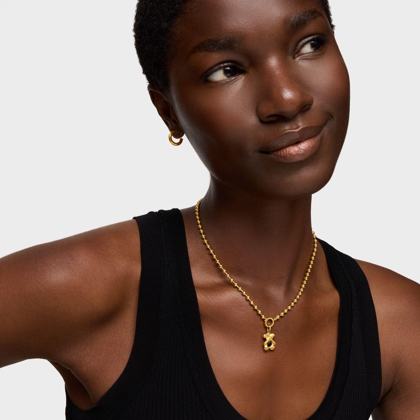 Colgante con baño de oro 18 kt sobre plata y ónix TOUS Sweet 40s-3