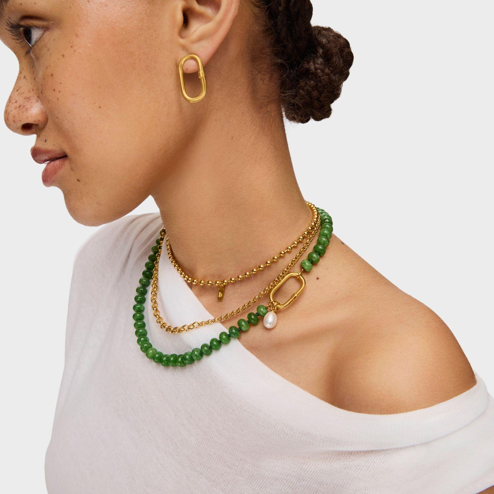 Colgante pequeño baño de oro 18 kt y perla culti Hold Oval-4