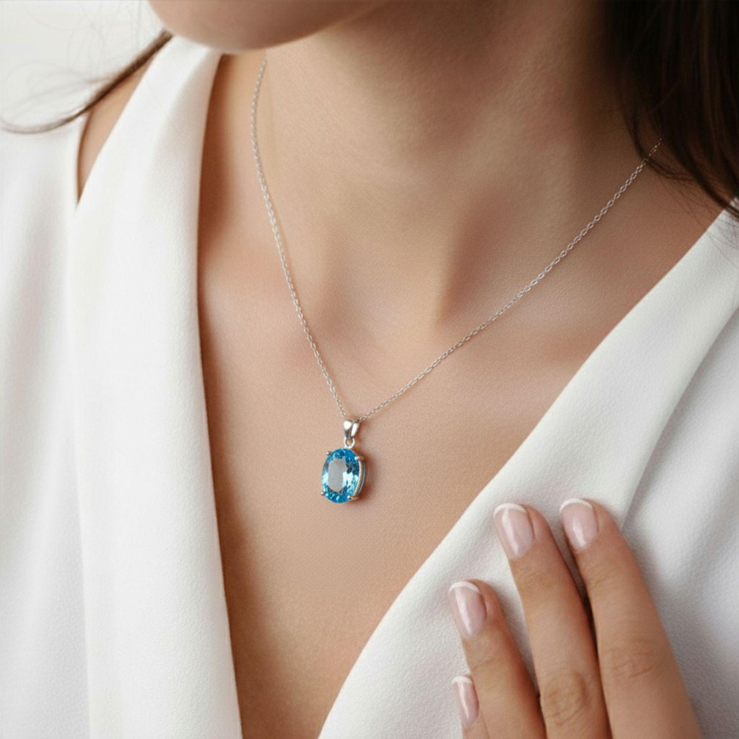 Collar topacio azul natural engastado en grifa-2