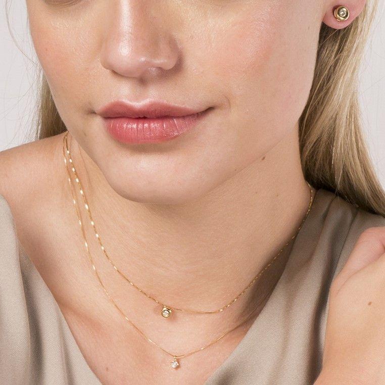 Punto De Luz Oro Amarillo 18K Diamante Bisel 0.10 Ct-1