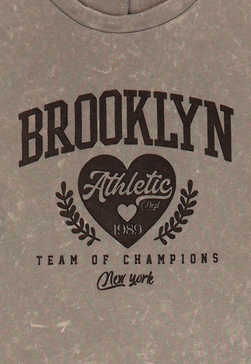 Polera jr niña h/caido squad 356v-2