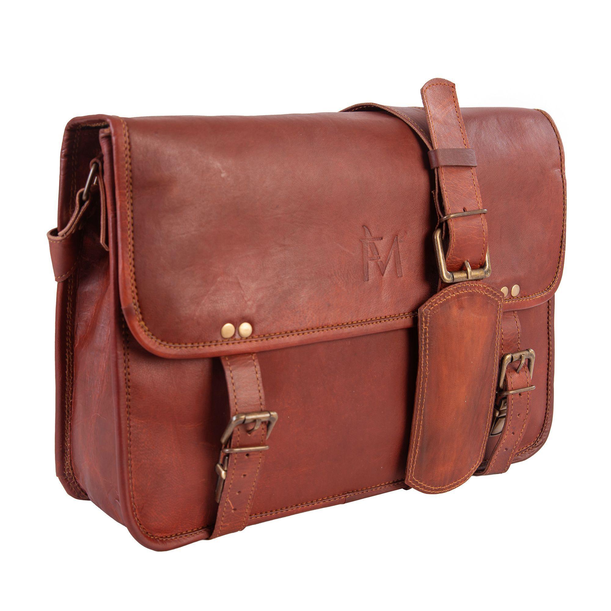 Maletín de cuero natural. Color marrón. Uso al hombro.-0