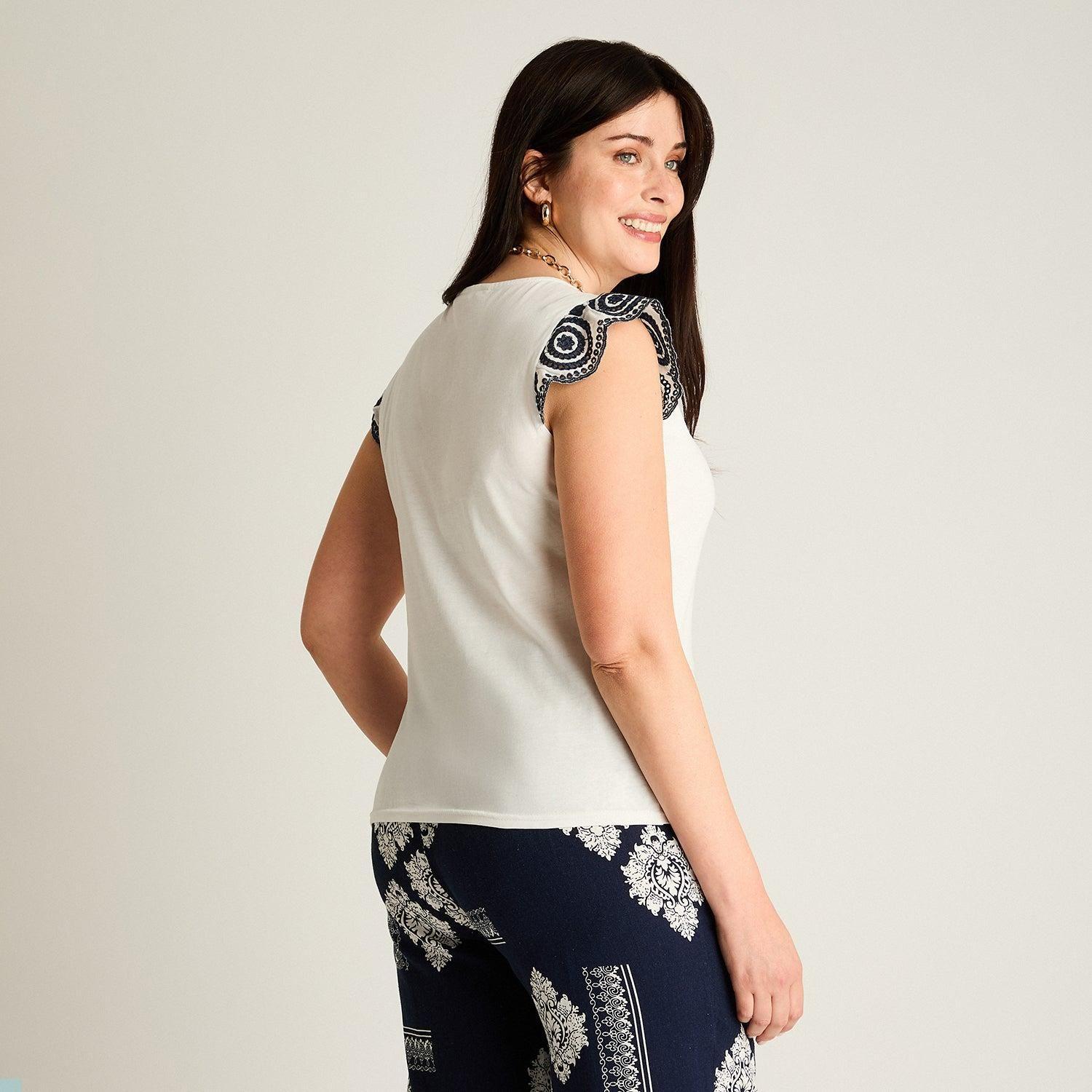 Polera Blanca Sin Mangas-1