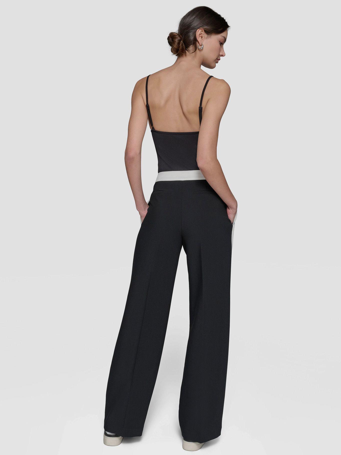 Pantalón con pliegues en contraste Negro-3