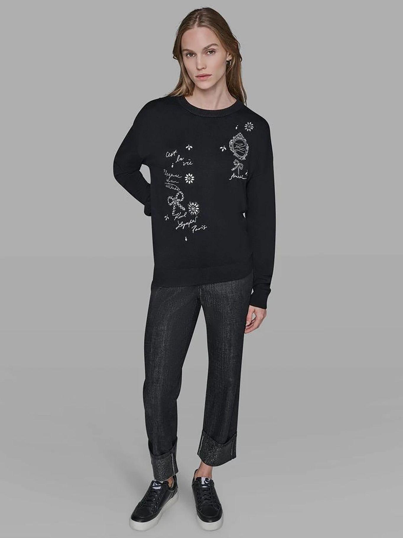 Sweater detalle gráfico distintivo en pedrería Negro-1