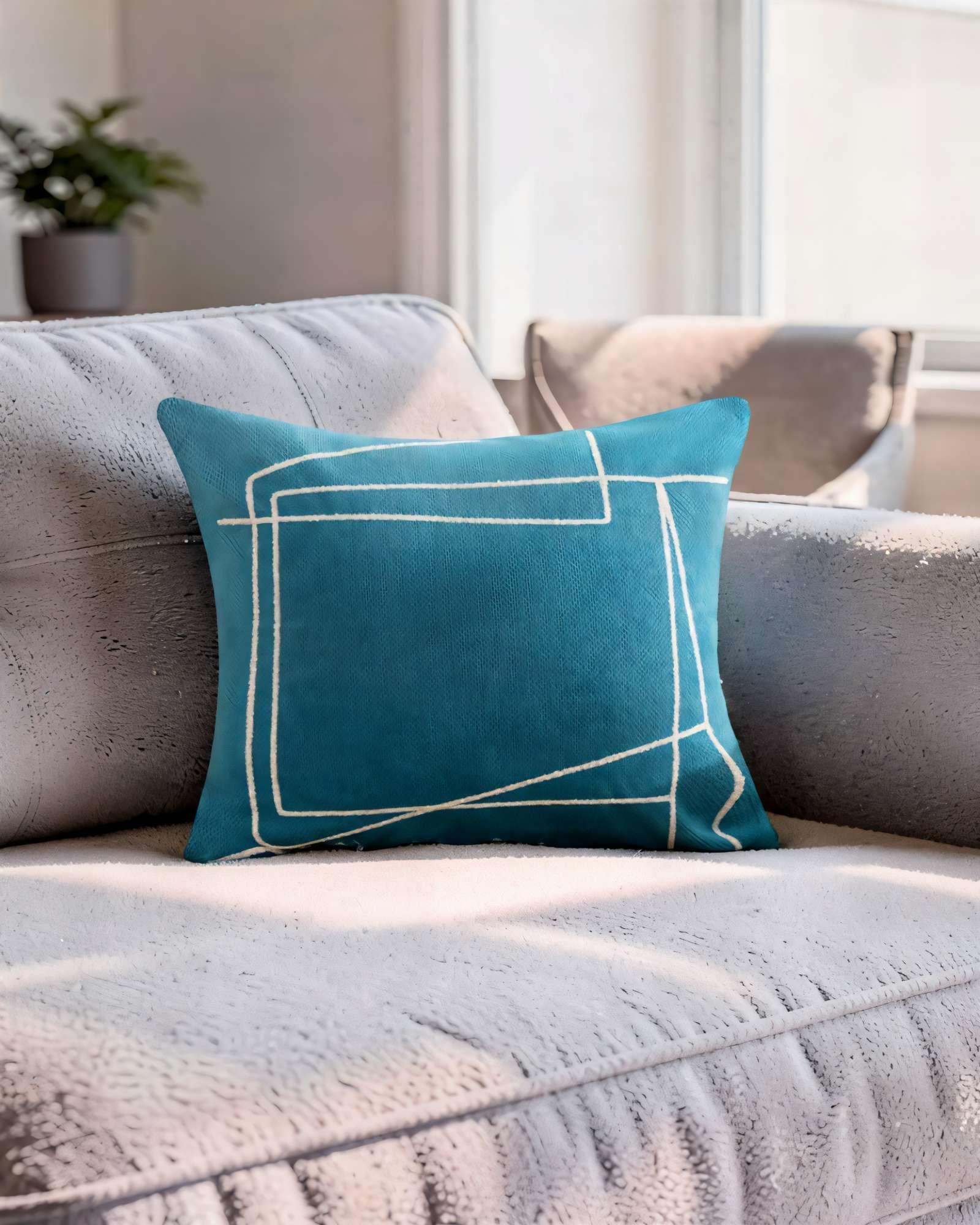 SET DE 2 FUNDAS DE COJIN 45CMX45CM  BORDADO DE LINEA COLOR AZUL-2