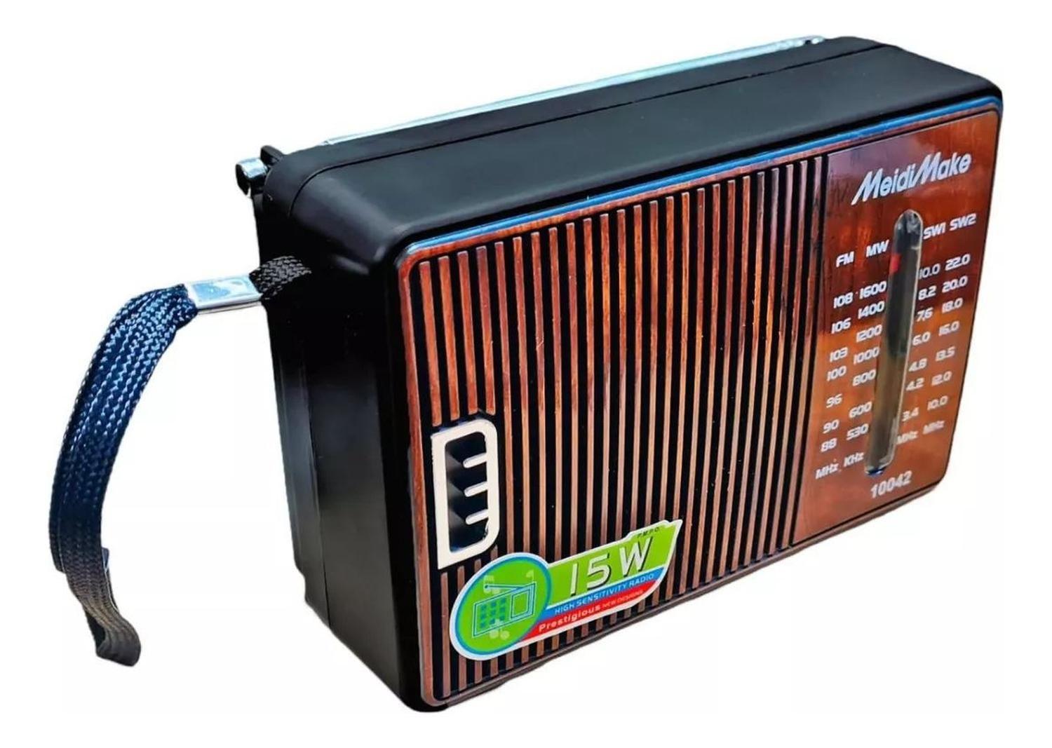 Radio Portatil De Mano A Pilas Am Fm Diseño 2-4