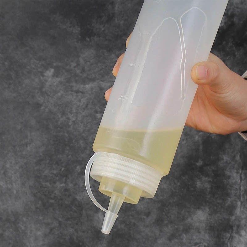 SET DE 2 BOTELLAS DISPENSADORAS SALSA GRADUADA TRANSPARENTE 600ML-6