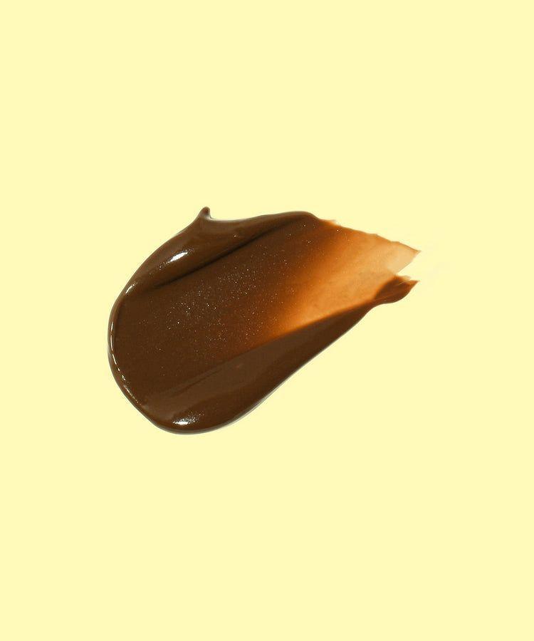 LOCIÓN BRONCEADORA CON PROTECCIÓN SOLAR SPF 15-1