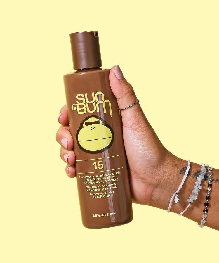 LOCIÓN BRONCEADORA CON PROTECCIÓN SOLAR SPF 15-3