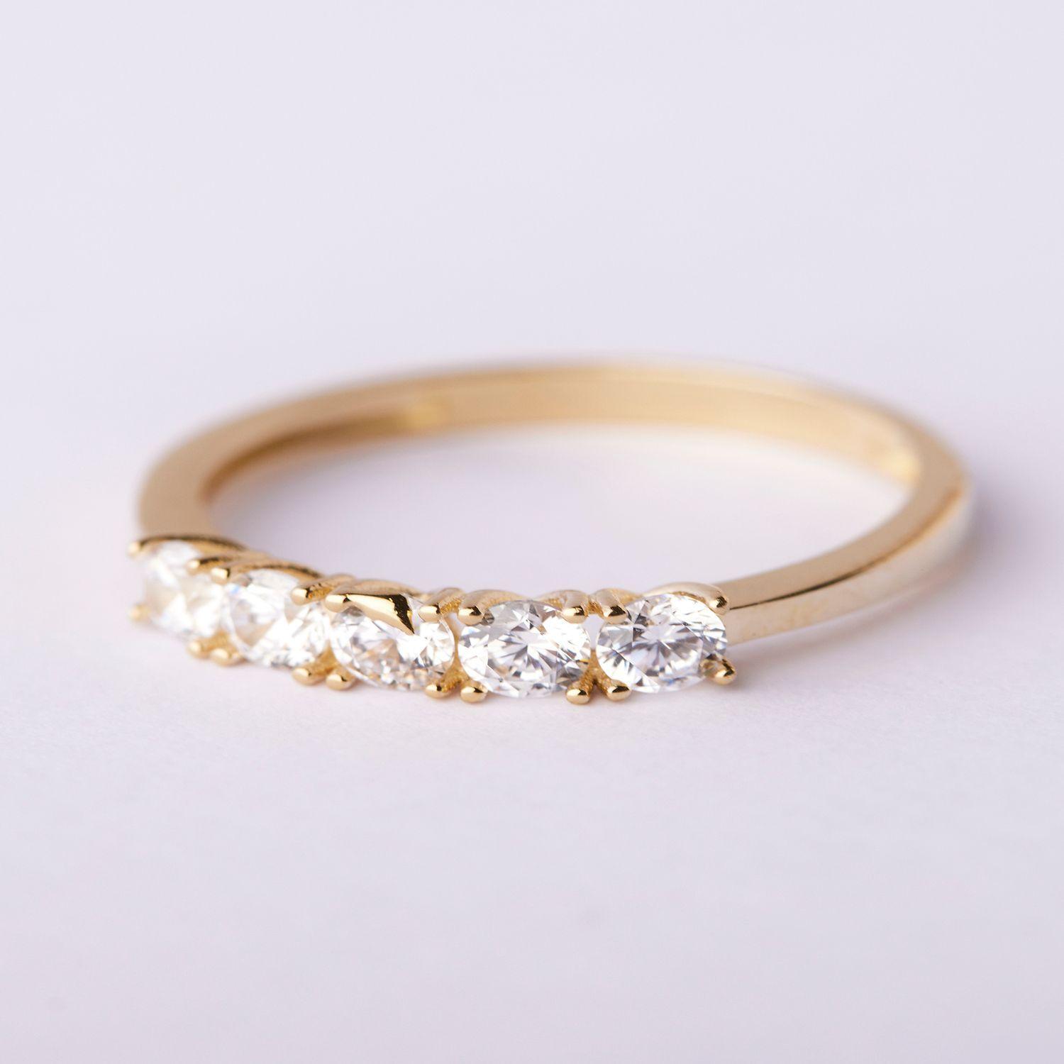 Anillo de oro 18kt 5 circones 4 grifas c/u-0