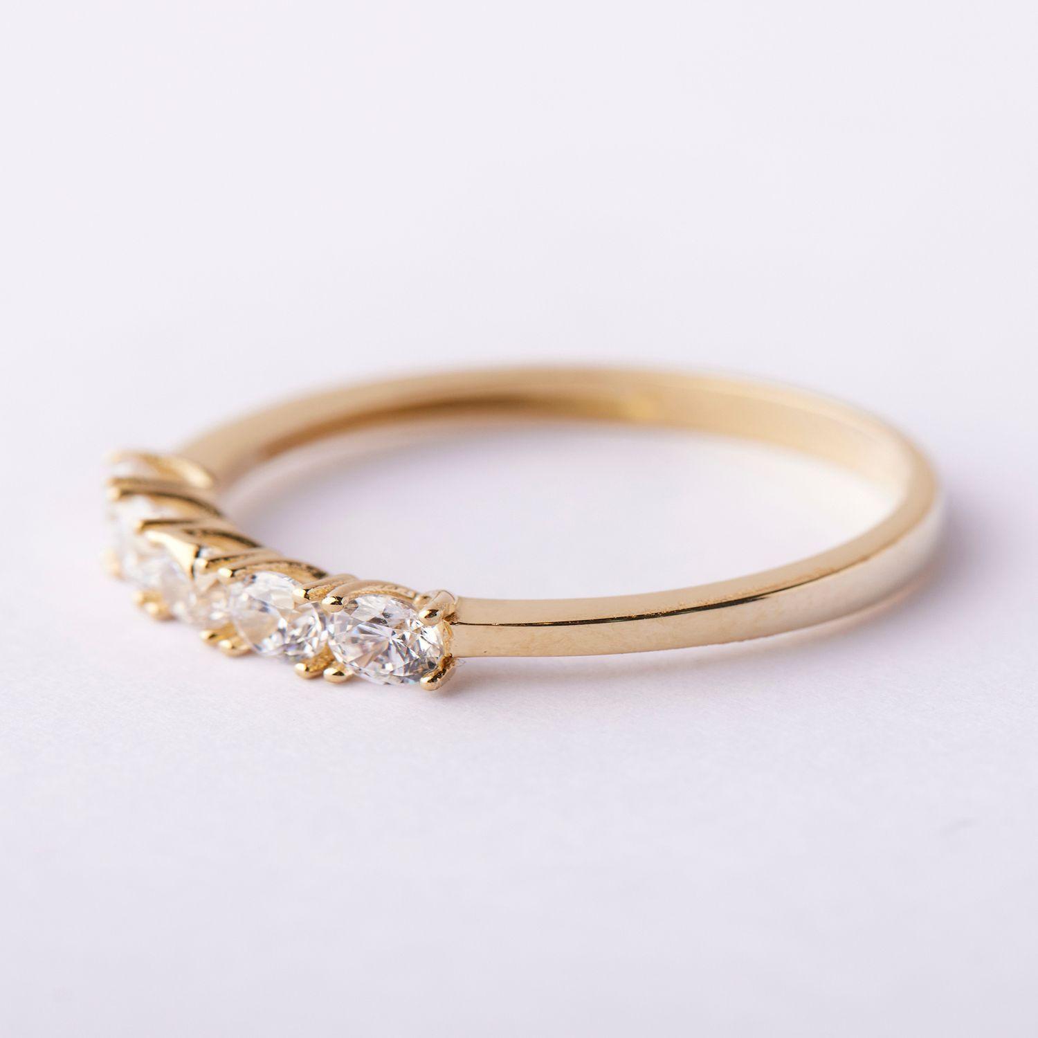 Anillo de oro 18kt 5 circones 4 grifas c/u-2