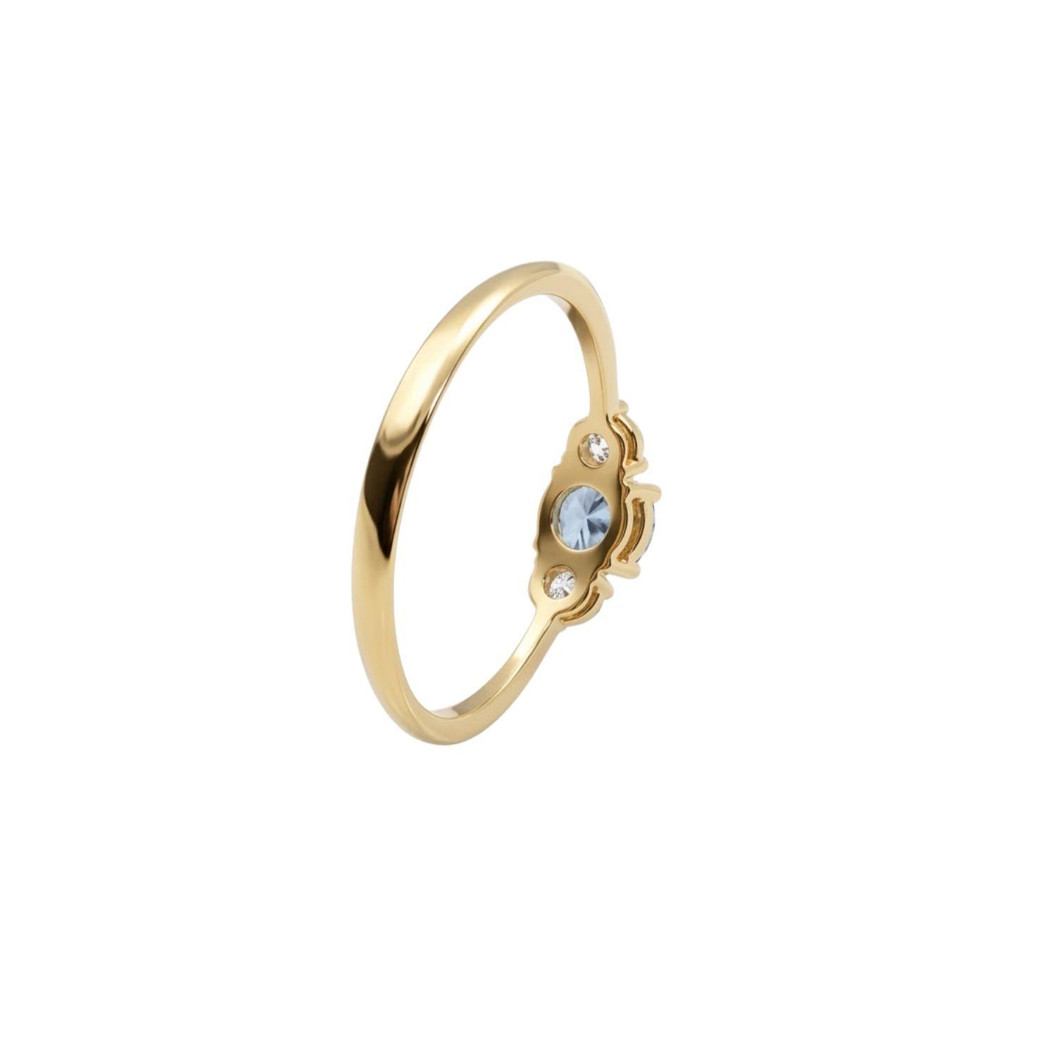 Anillo Oro Miel 18kt Trilogía con Circonita Aguamarina-1