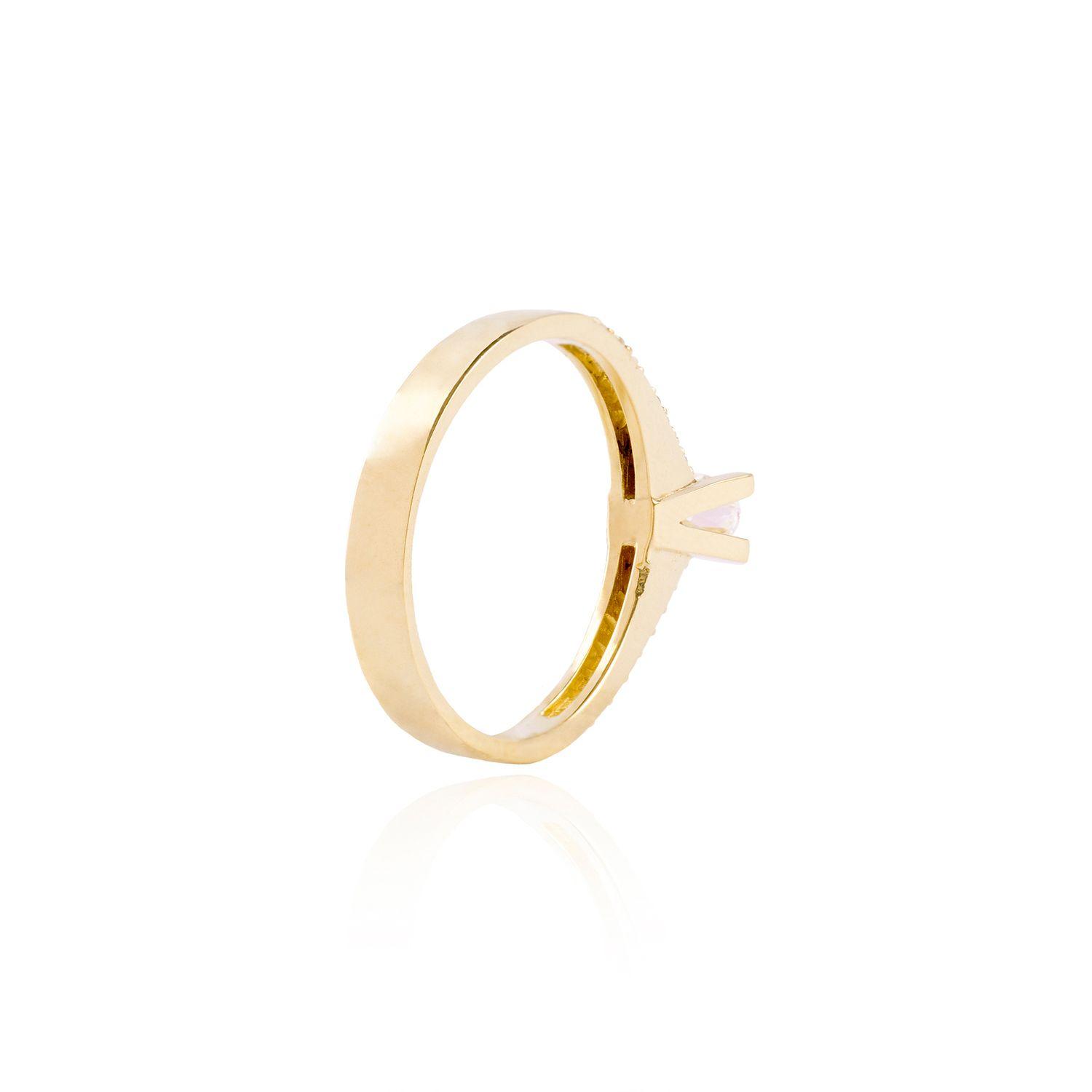 Anillo de oro 18kt Solitario Circón 3 mm mas laterales-1