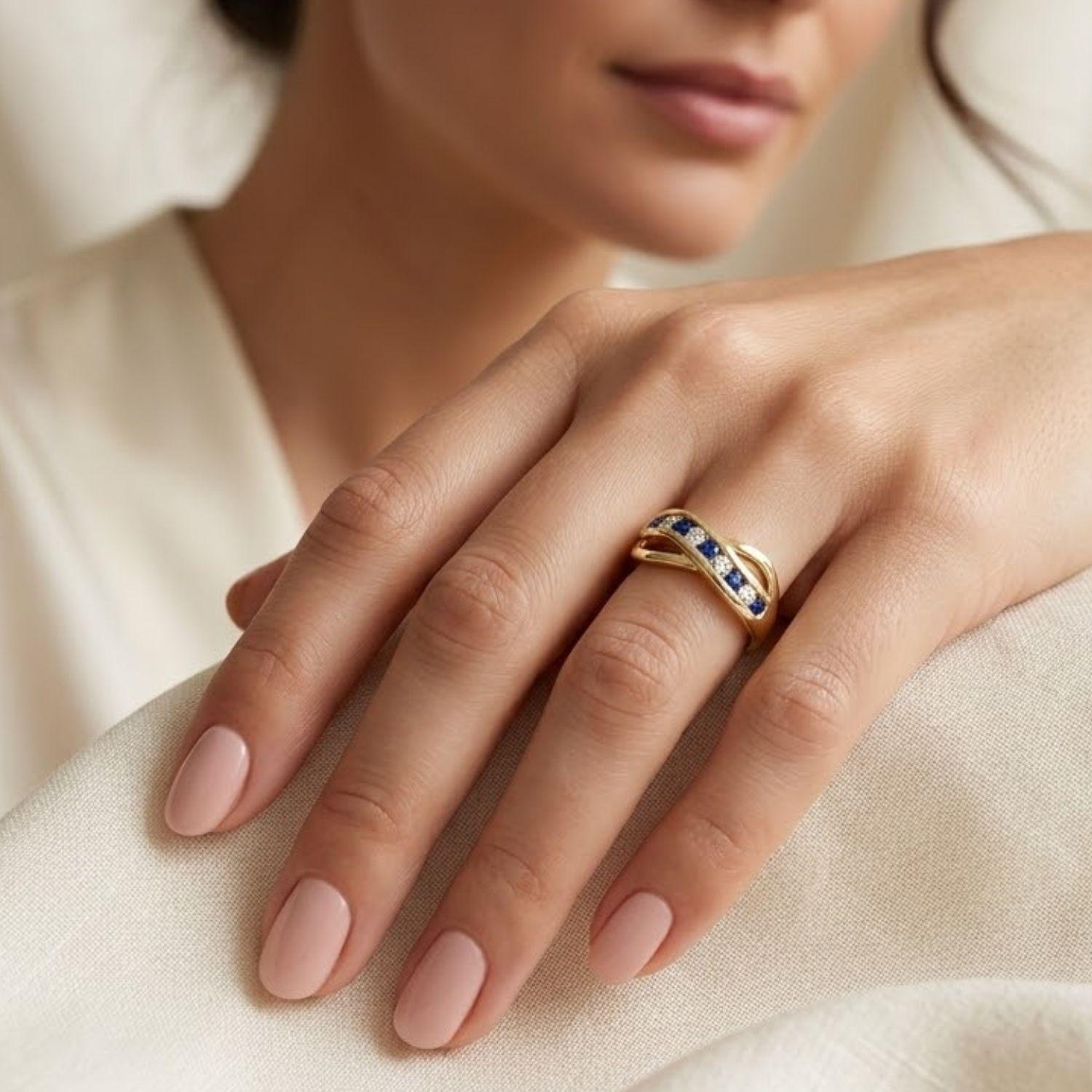 Anillo Oro Miel 18kt Infinito con Zafiros y Circonitas-3
