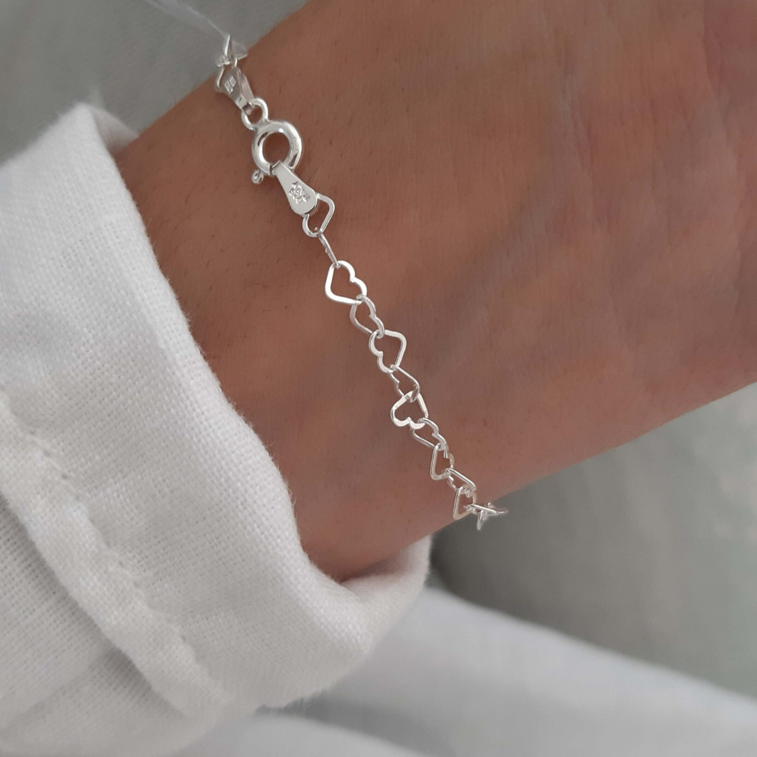 Pulsera de plata corazones-2