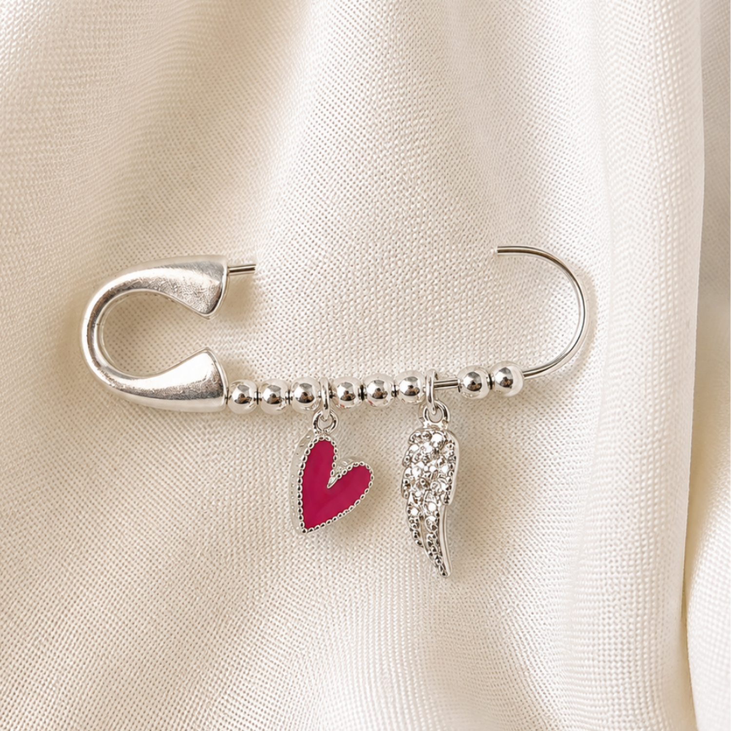 Prendedor Bañado en Plata con Corazón Magenta y Ala de Ángel – amor propio y la protección de tu áng-0