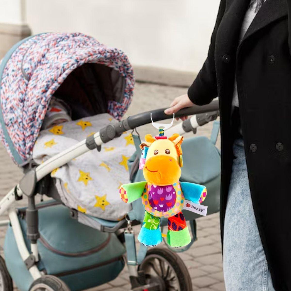 SONAJERO PELUCHE COLGANTE MUSICAL SENSORIAL BEBE LAU-6