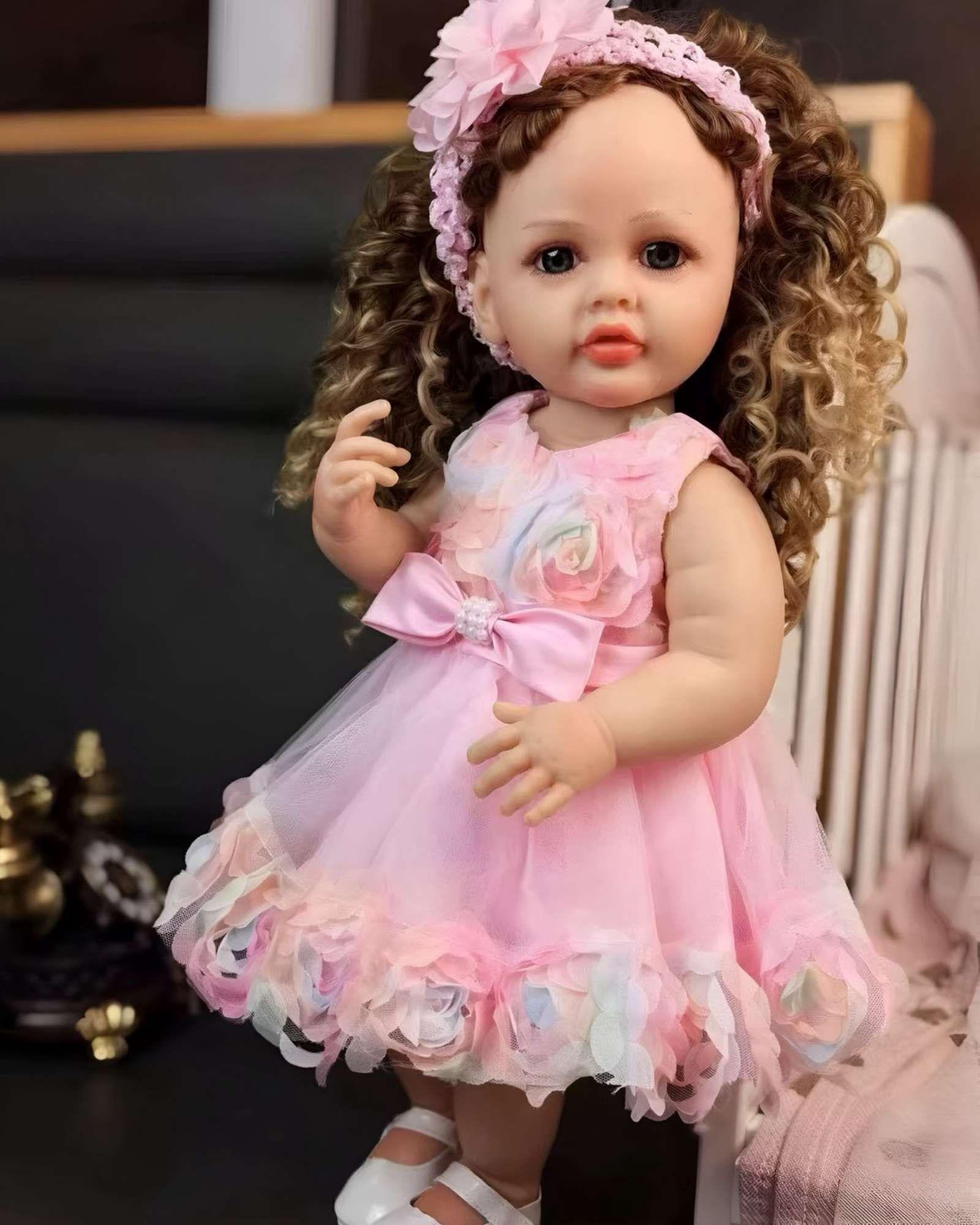 MUÑECA BEBÉ REALISTA DE 55 CM 100% SILICON CON VESTIDO W3-4