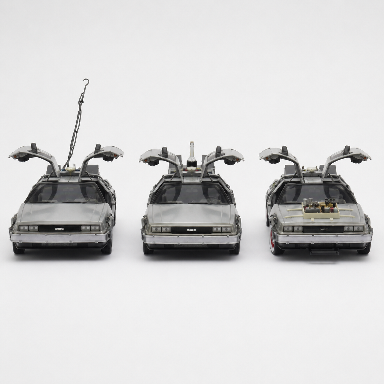 Pack x3 DeLorean Volver al Futuro Trilogía Welly 1:24-2