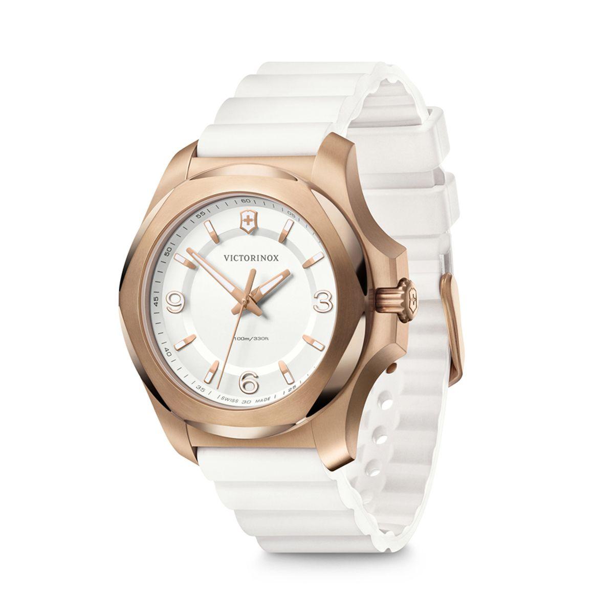 Reloj I.N.O.X. V dial blanco, correa caucho blanco, detalles dorados.-1