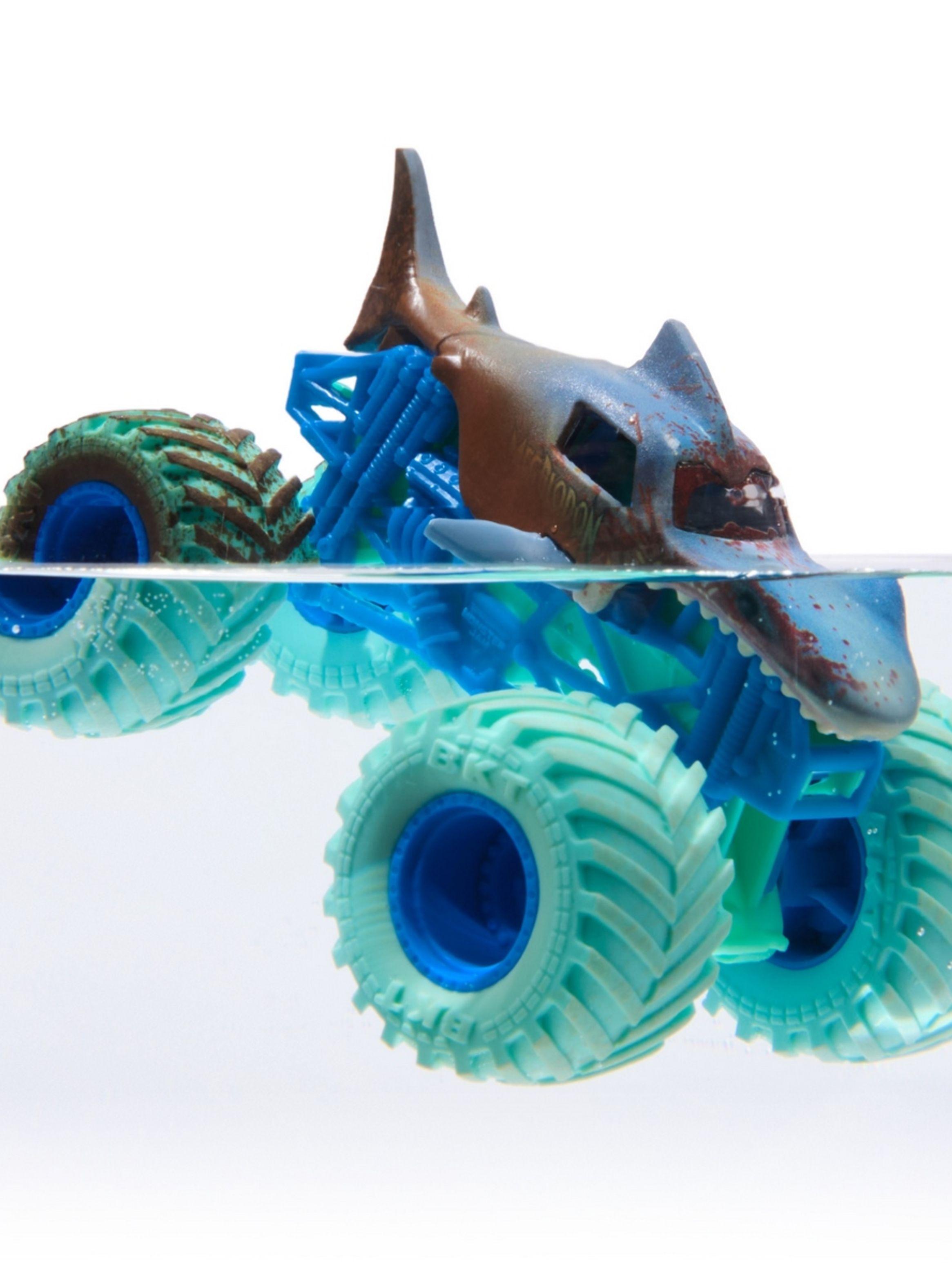 Vehículo Monster Jam 1:64 Megalodon cambia color-3