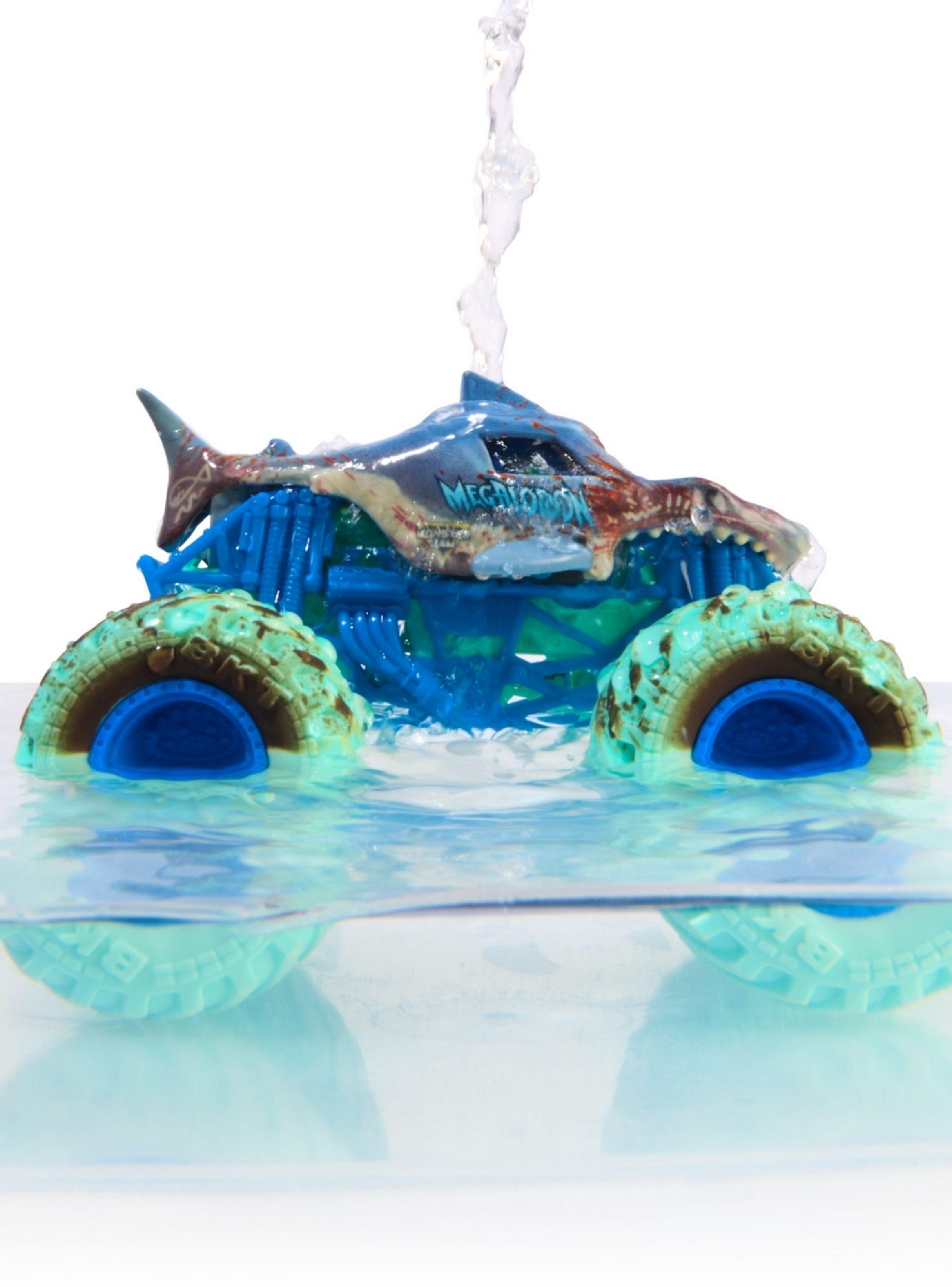 Vehículo Monster Jam 1:64 Megalodon cambia color-4