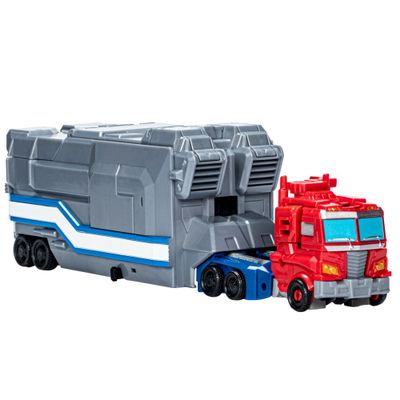 Figura de Acción Transformers EarthSpark Optimus Prime Con Remolque de Combate