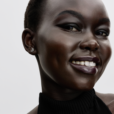 Imagen 2 del producto Aretes de Botón Moño Reluciente