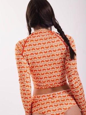 Imagen 2 del producto Polera Surf Daikiri Mujer Manga Larga Flores Naranjo Rojo Filtro UV50+