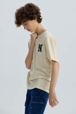 Imagen 2 del producto Polera Niño Cuello Bordado Crudo