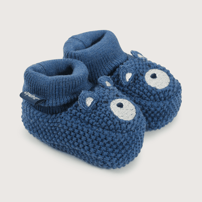 Pantufla bebé tejida azul de niño