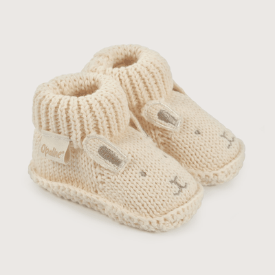 Pantufla bebé tejida beige de niña